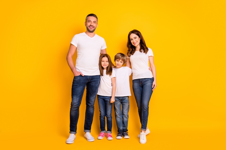 family in matching outfits wall art