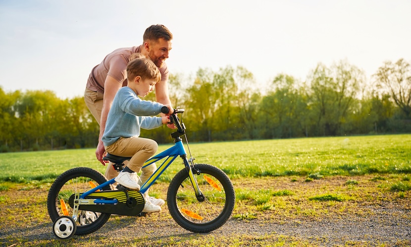 young boy riding bike