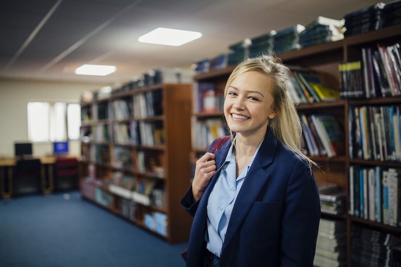school girl in library